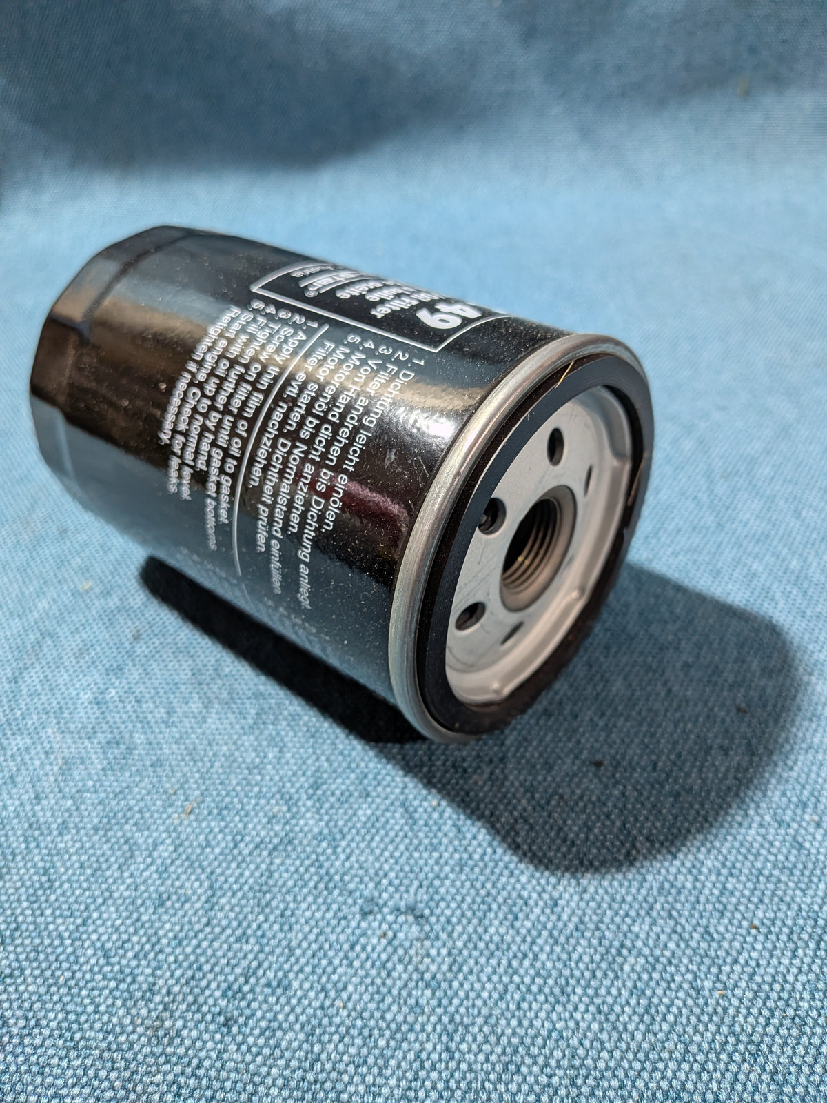 Oil filter Mahle OC49 Iltis/Golf/Jetta/1/2/K70/Beetle/Santana/Scirocco/1/2/LT1/Derby/Passat/B1/B2/B3/B4/Polo/1/86C/Golf 3/Vento/T4 Bus/Corrado/Caddy14D/Audi 80/90/B2/B3/B4/100/200/C1/C2/C3/C4/50/A4 B5/A6 C4 89201808900 NOS/New A26