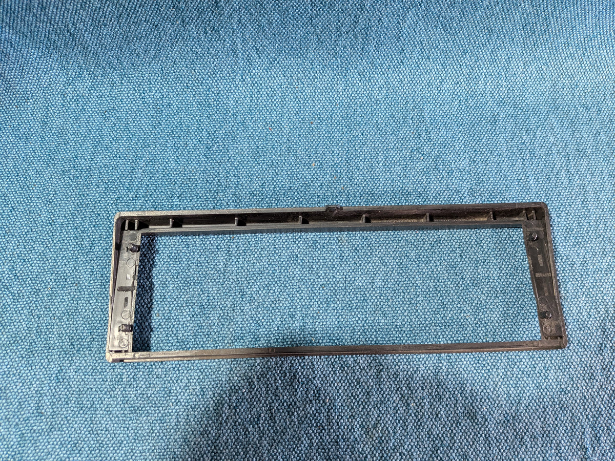 Radio bezel Gamma Golf/Jetta/1/2/Caddy14D/Corrado 165035464A Used C8
