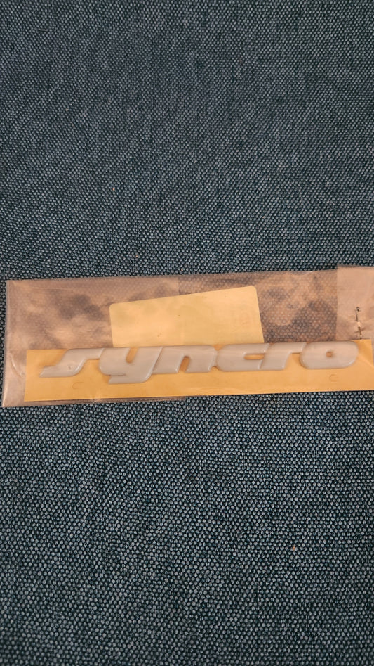 Syncro Emblem Passat B2/B3/Golf/Jetta/2/T4 Bus 333853675/GRU New Old Stock