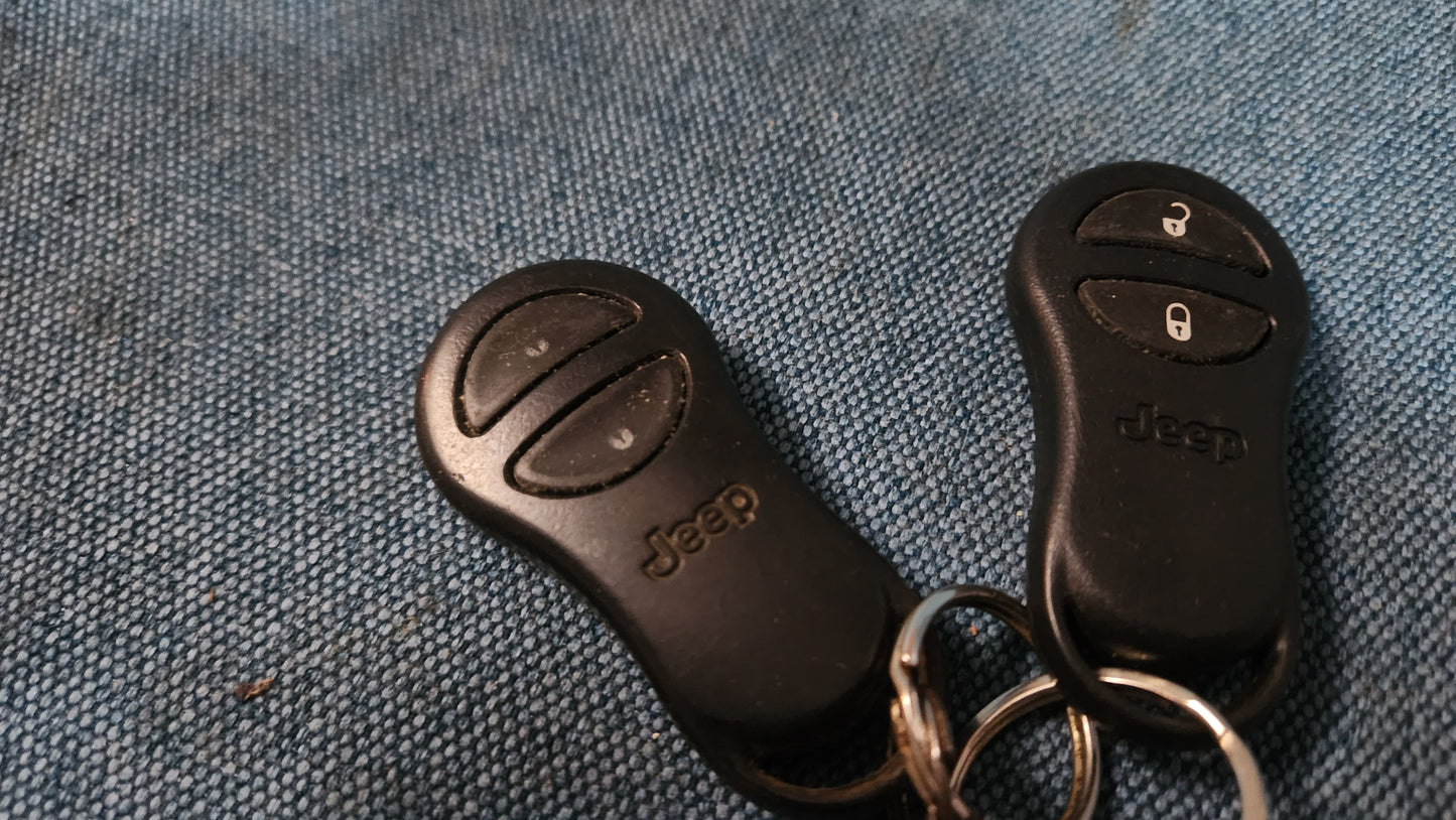 2x Jeep Grand Cherokee Transmitter Keys Keyless Go 56036862AC Used B2
