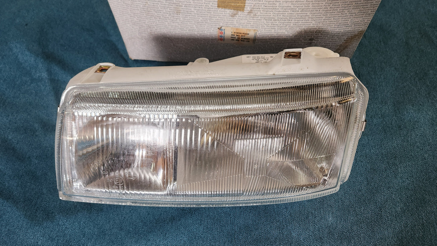Passat B3/B4 Scheinwerfer 3A0941017 Nos T1/2