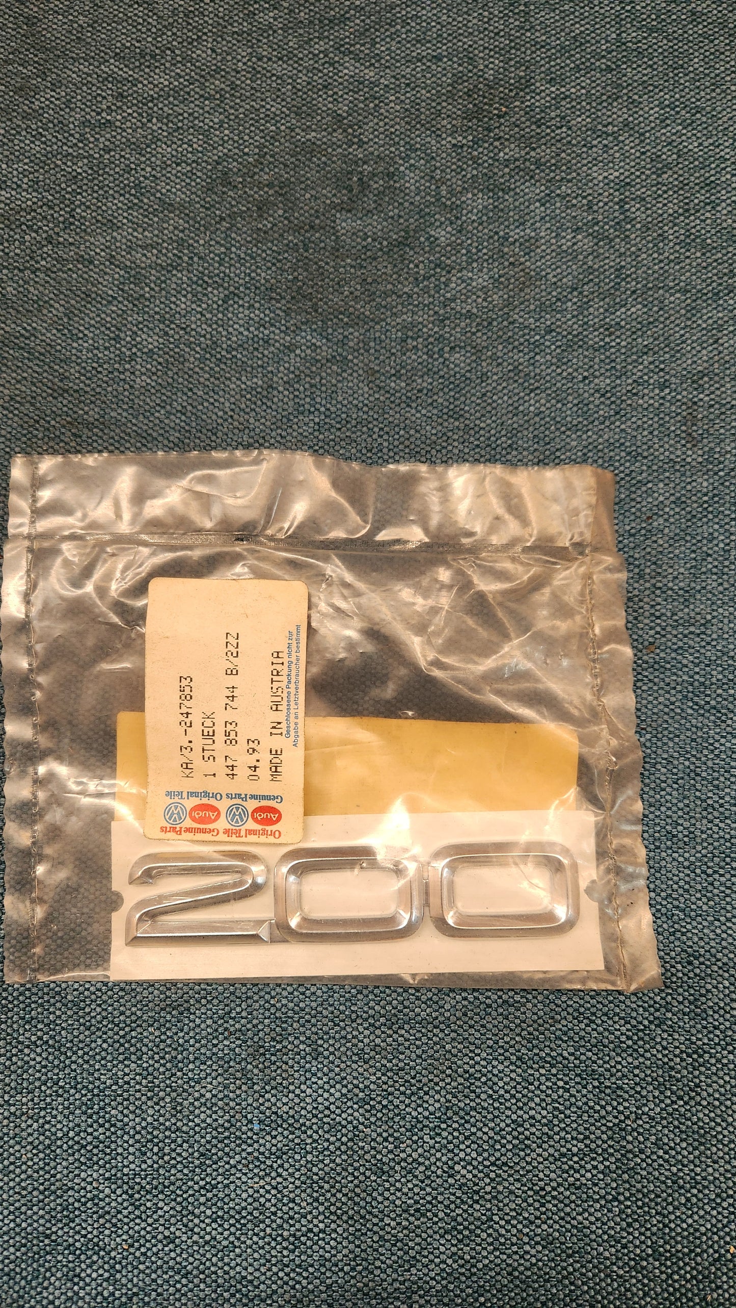 Audi 200 C3/C4 Emblem/Schriftzug 447853744 Nos H7