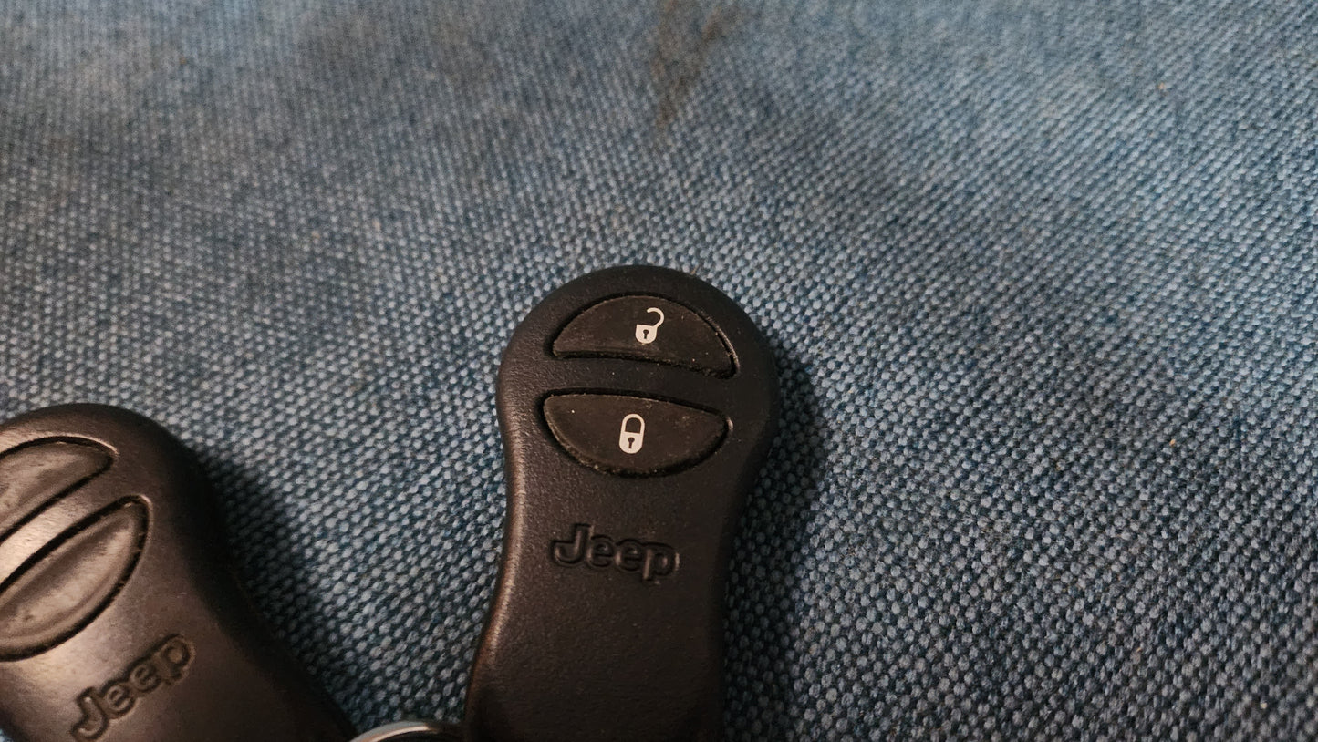 2x Jeep Grand Cherokee Transmitter Keys Keyless Go 56036862AC Used B2