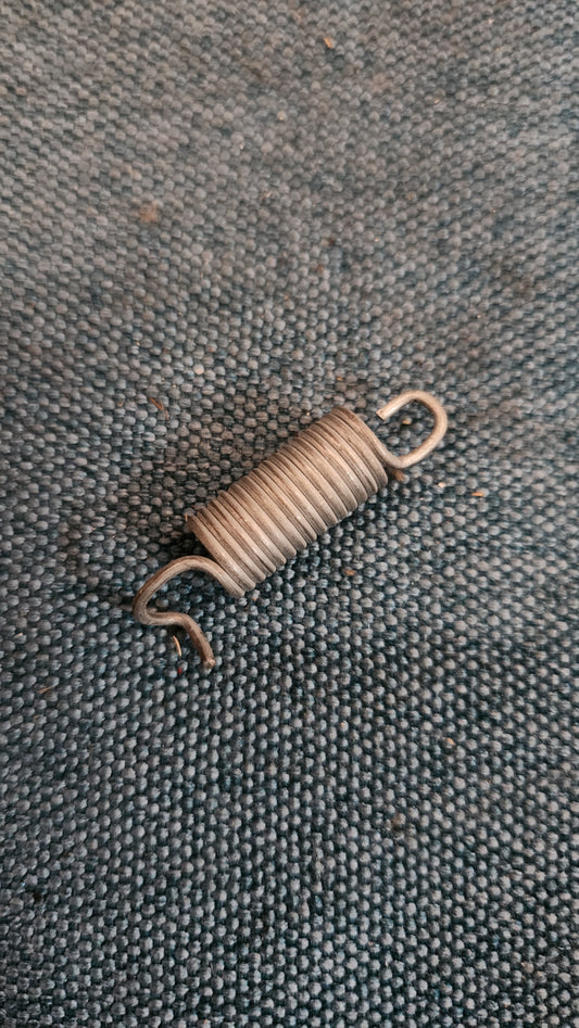 Tension spring Golf/Jetta1/2/Caddy14D/Scirocco2/Polo86C/PassatB2 321881177 Nos I8