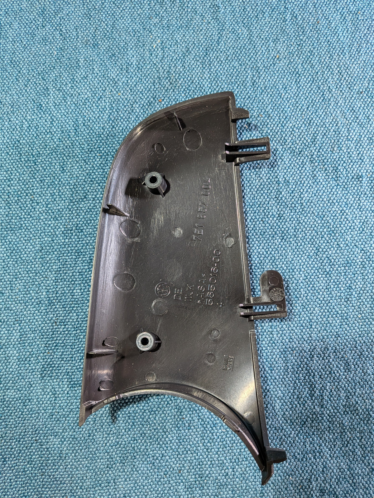Blende Außenspiegel unten links T5 Bus 7E1857604 NOS B24